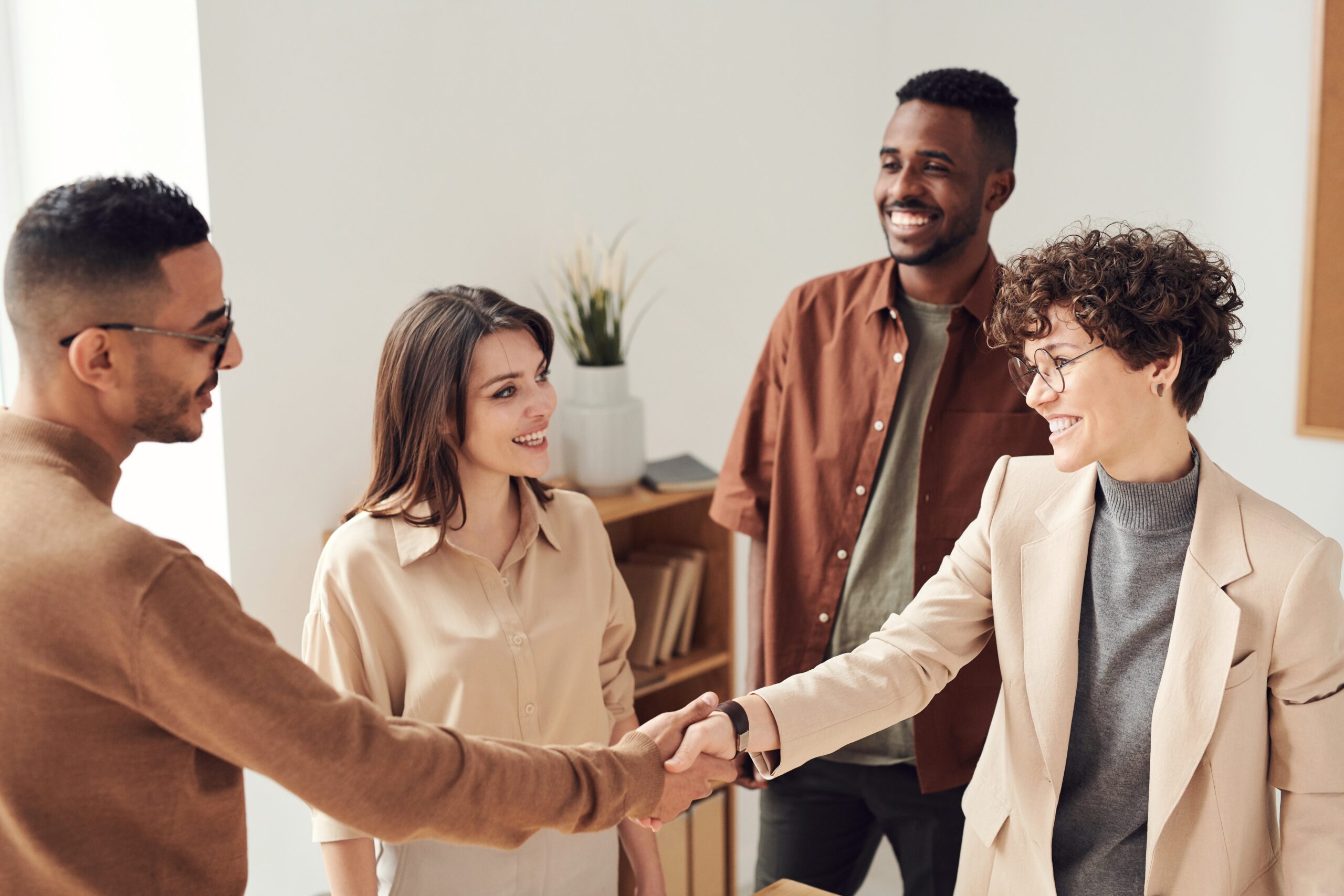 3 organizers meeting with a client