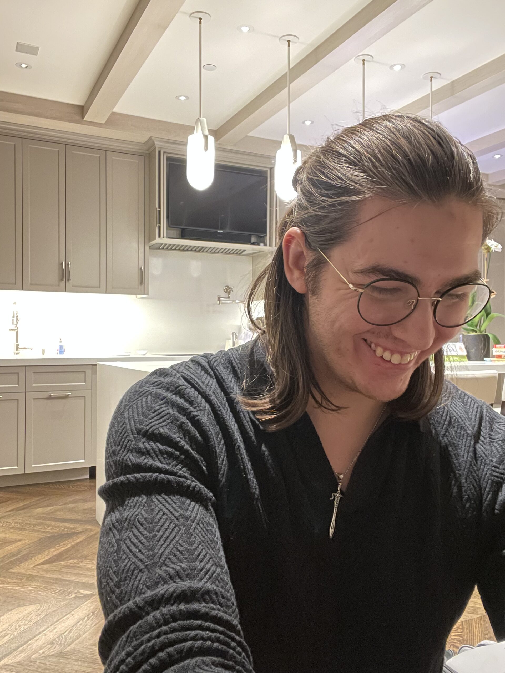 Owner, smiling while organizing